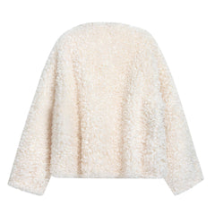 A white, fluffy, and soft-looking sweater or cardigan is shown against a white background.