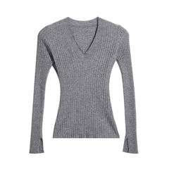 A gray ribbed sweater with a V-neck and long sleeves.