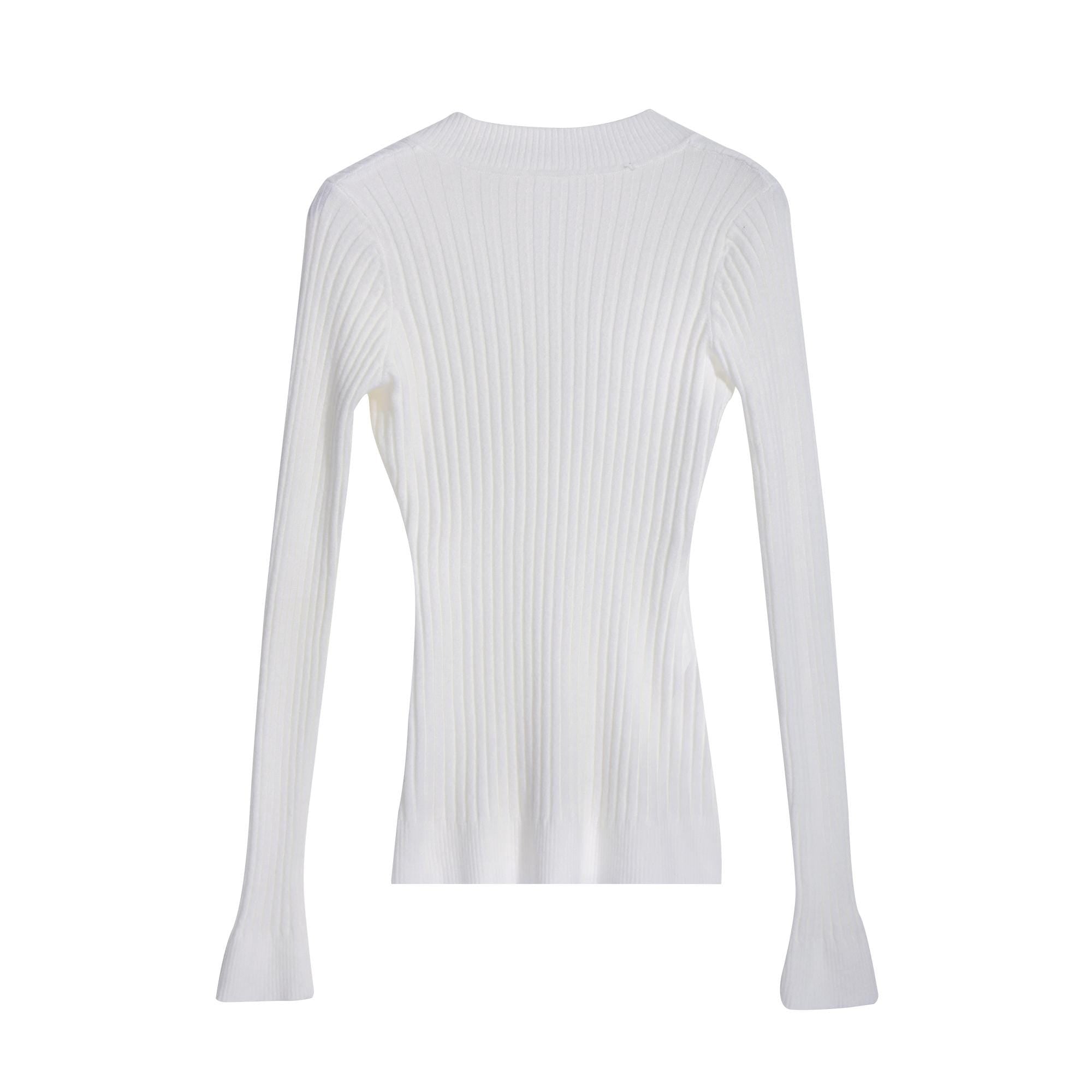 A white long-sleeved sweater with a ribbed texture.