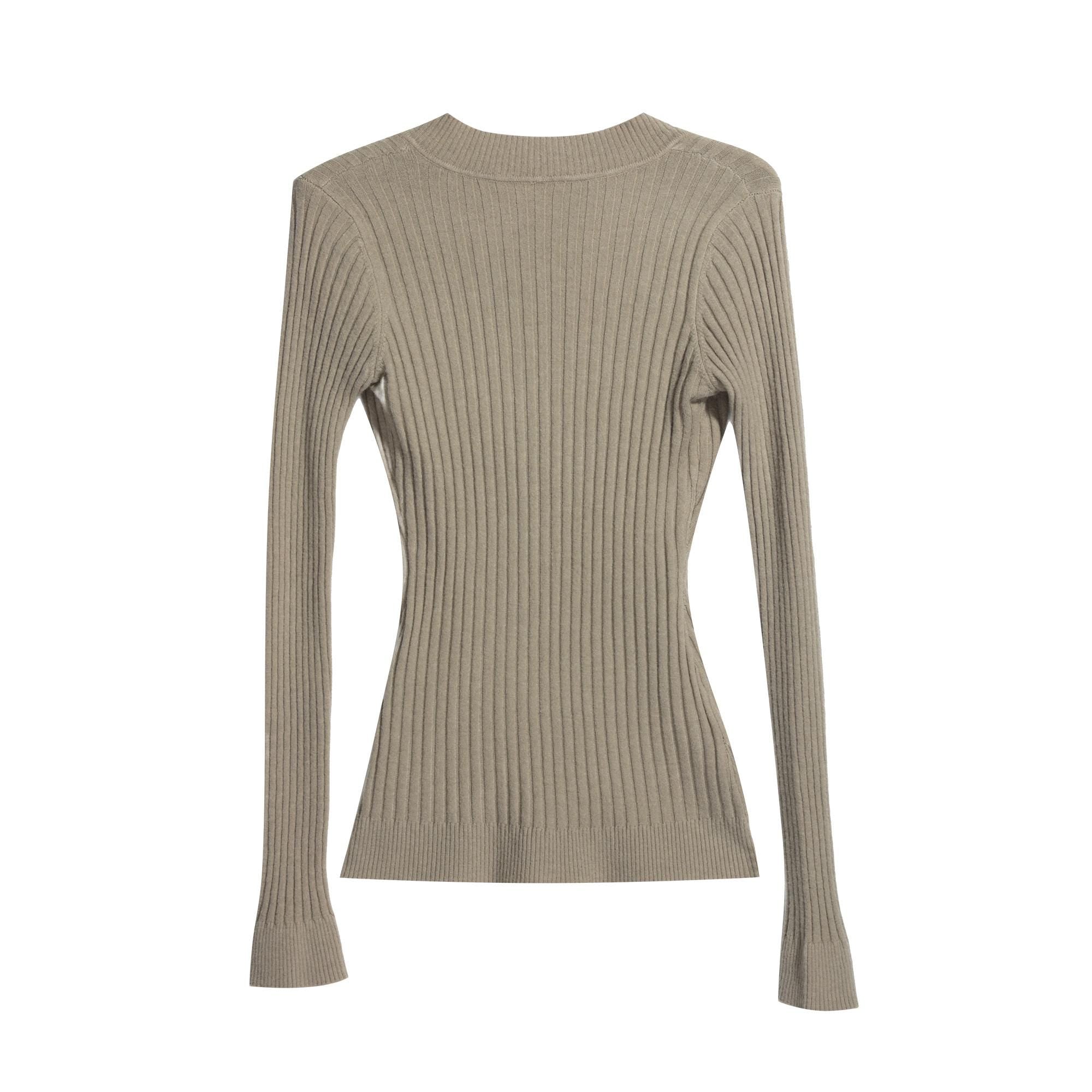 A beige ribbed sweater with long sleeves, displayed against a white background.