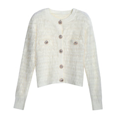 A cream-colored knitted cardigan with buttons, displayed against a white background.