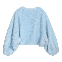 A light blue, fluffy, puffed-sleeved garment with a soft, plush texture.