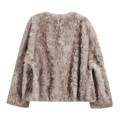 A long-sleeved, furry jacket in a light brown color.