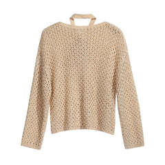 A beige knitted sweater with a high neck and long sleeves.