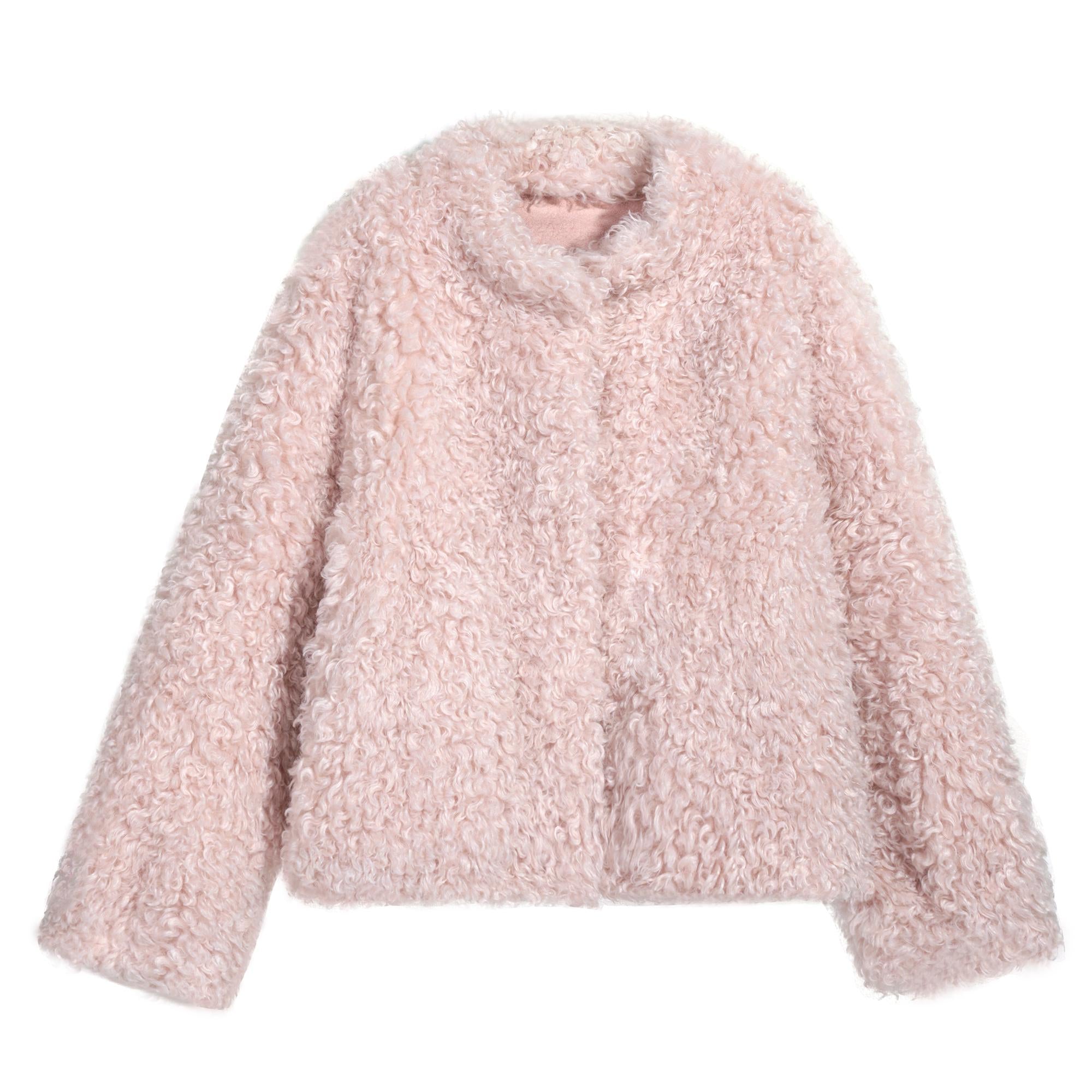 A pink, fluffy, and soft-looking jacket is shown against a white background.