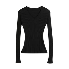 A black long-sleeved sweater with a v-neck and ribbed texture.