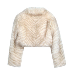 A white fur coat with a zigzag pattern on the back.